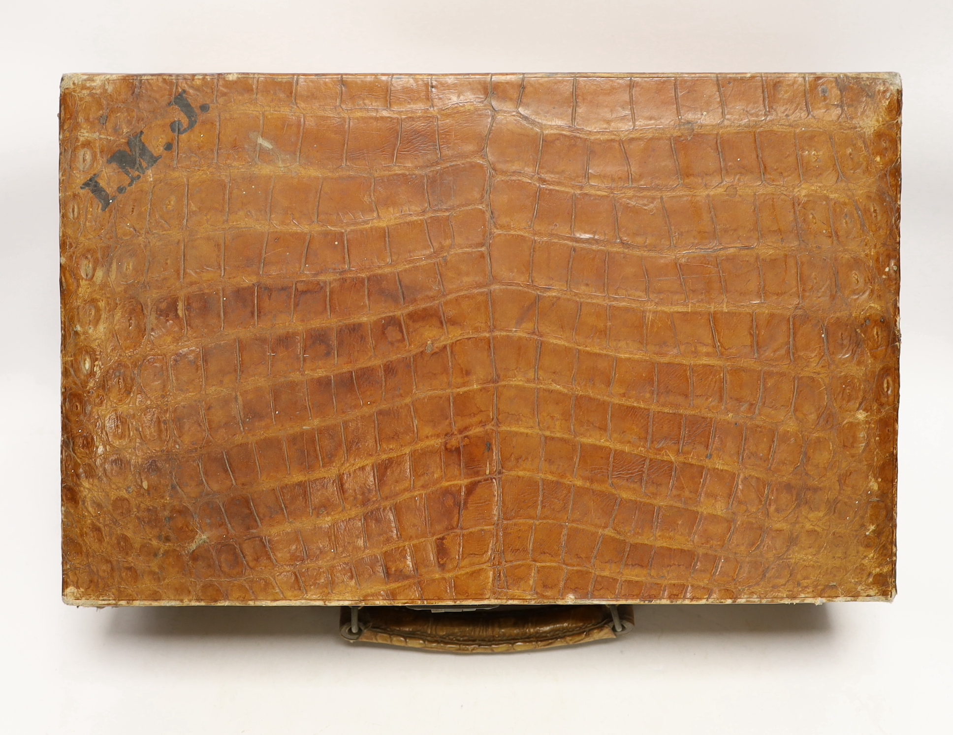 Two crocodile skin cases, 1930s, largest 41cm x 26cm x 15.5cm